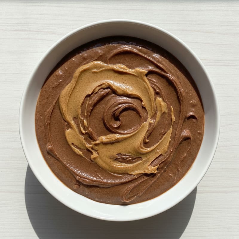 Silky Chocolate Protein Pudding with Almond Butter Swirl
