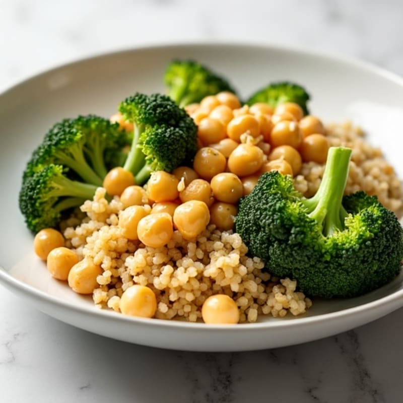 Chickpea and Quinoa Bowl with Roasted Broccoli and Lemon Tahini Drizzle