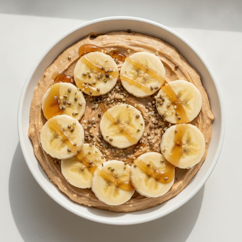 Creamy Peanut Butter Protein Mousse with Sliced Bananas