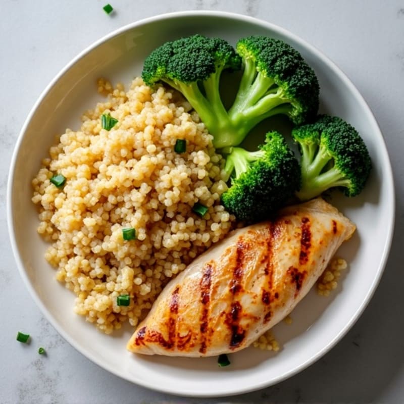 Grilled Chicken Breast with Quinoa and Steamed Broccoli