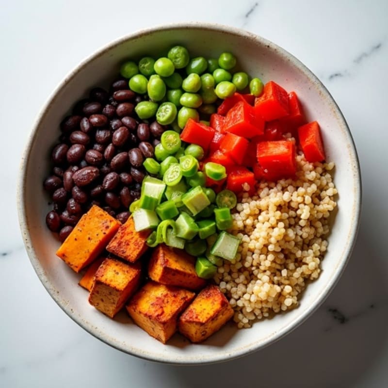 Spicy Black Bean Quinoa Bowl with Roasted Sweet Potato