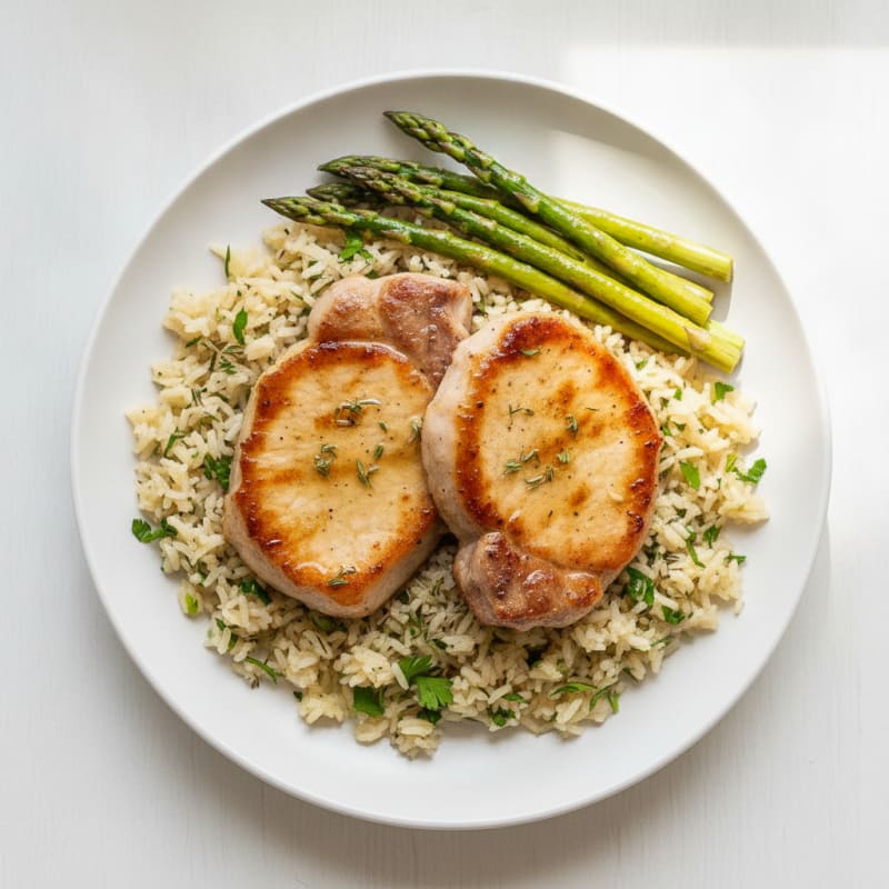 Pan-Seared Pork Chops with Herbed Rice