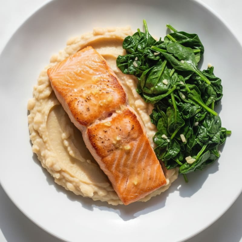 Seared Salmon Fillet with Creamy White Bean Mash and Sautéed Spinach