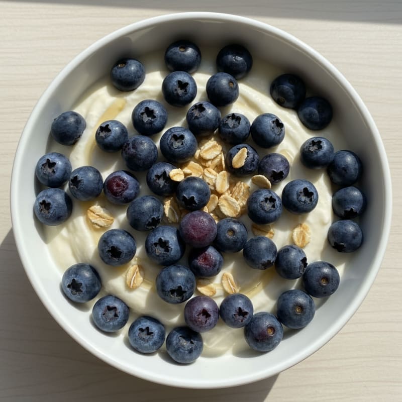 Vanilla Greek Yogurt with Protein Powder and Blueberries
