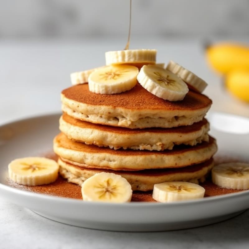 Fluffy Cinnamon-Spiced Banana Protein Pancakes