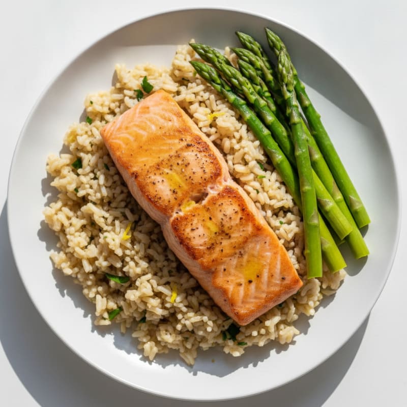 Seared Salmon Fillet with Steamed Asparagus and Lemon Herb Rice
