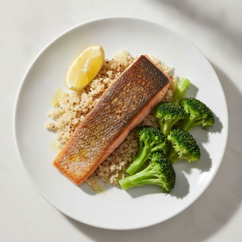Seared Salmon Fillet with Steamed Broccoli and Quinoa
