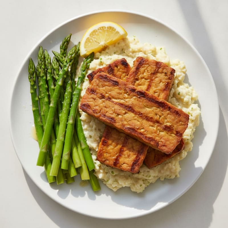 Grilled Tempeh with Steamed Asparagus and Cauliflower Mash
