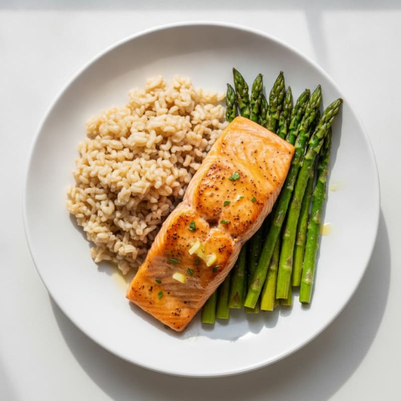 Seared Salmon Fillet with Herb-Roasted Asparagus and Brown Rice