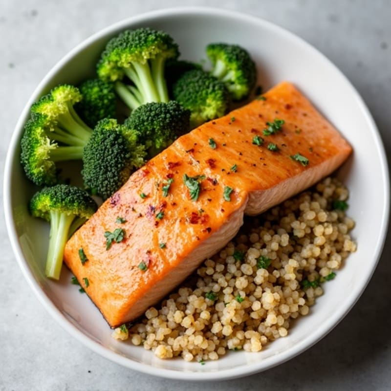 Seared Salmon Fillet with Steamed Broccoli and Quinoa