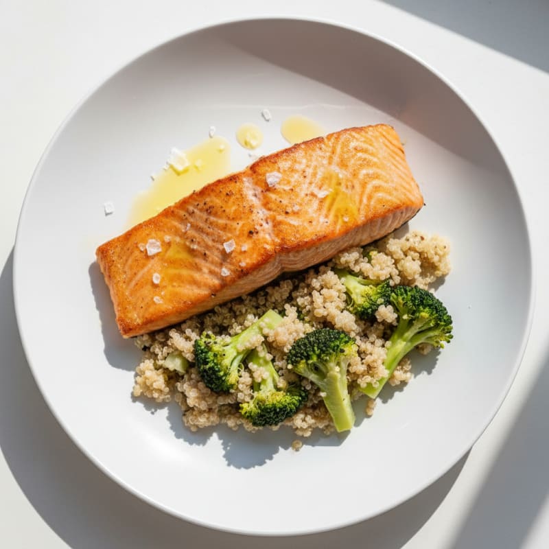 Seared Salmon Filet with Steamed Broccoli and Quinoa
