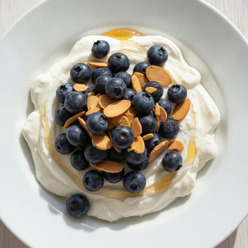 Greek Yogurt Bowl with Whey Protein, Berries, and Almonds
