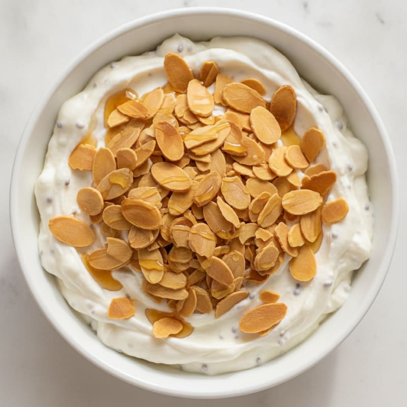 Creamy Greek Yogurt Protein Pudding with Sliced Almonds