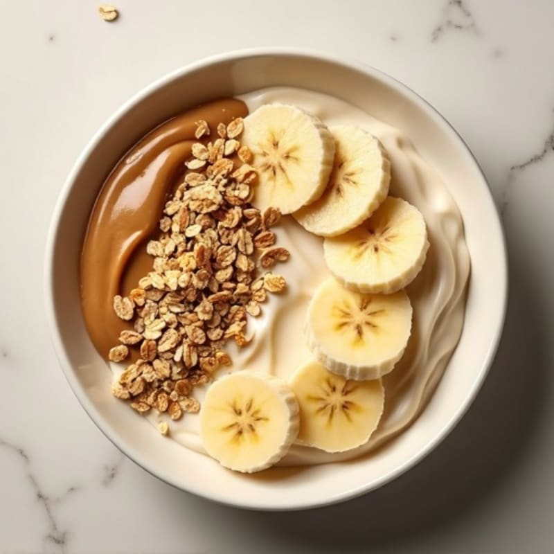 Creamy Peanut Butter Protein Bowl with Sliced Banana and Toasted Oats