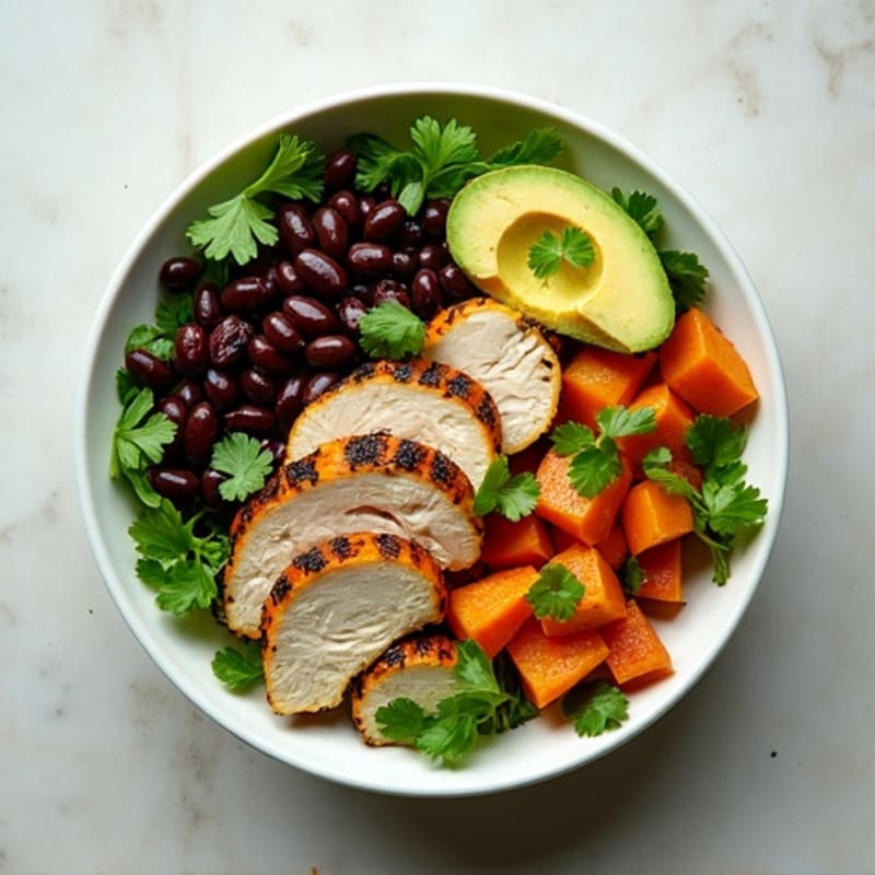 Roasted Sweet Potato and Black Bean Bowl with Creamy Avocado Dressing