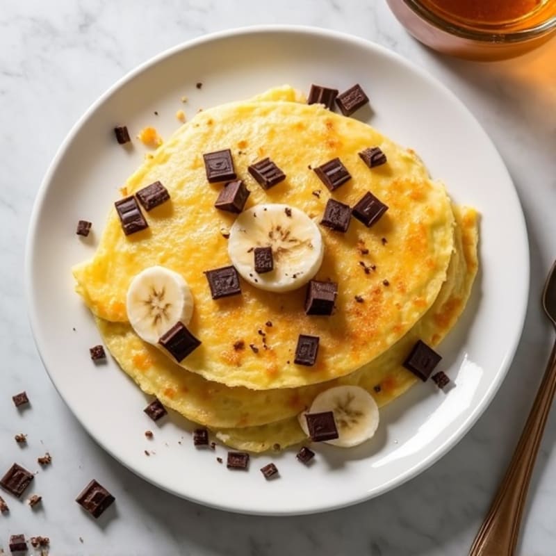 Fluffy Protein Omelette with Sliced Banana and Dark Chocolate