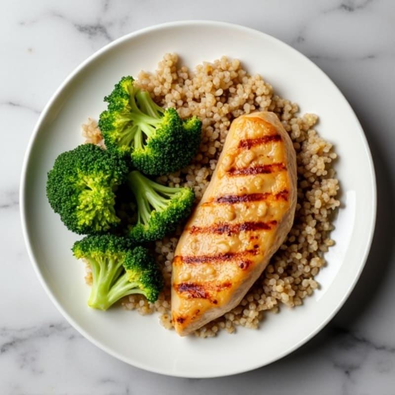 Grilled Chicken Breast with Quinoa and Steamed Broccoli