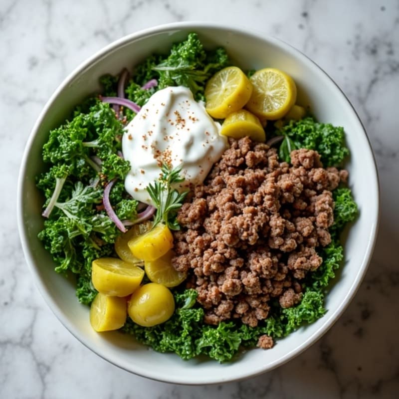Lean Ground Beef Bowl with Crispy Greens, Tangy Pickles, and Creamy Dressing
