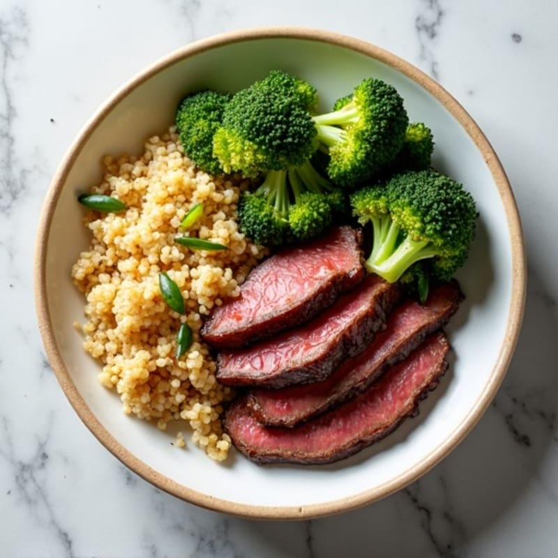 Seared Lean Beef Strips with Roasted Broccoli and Quinoa
