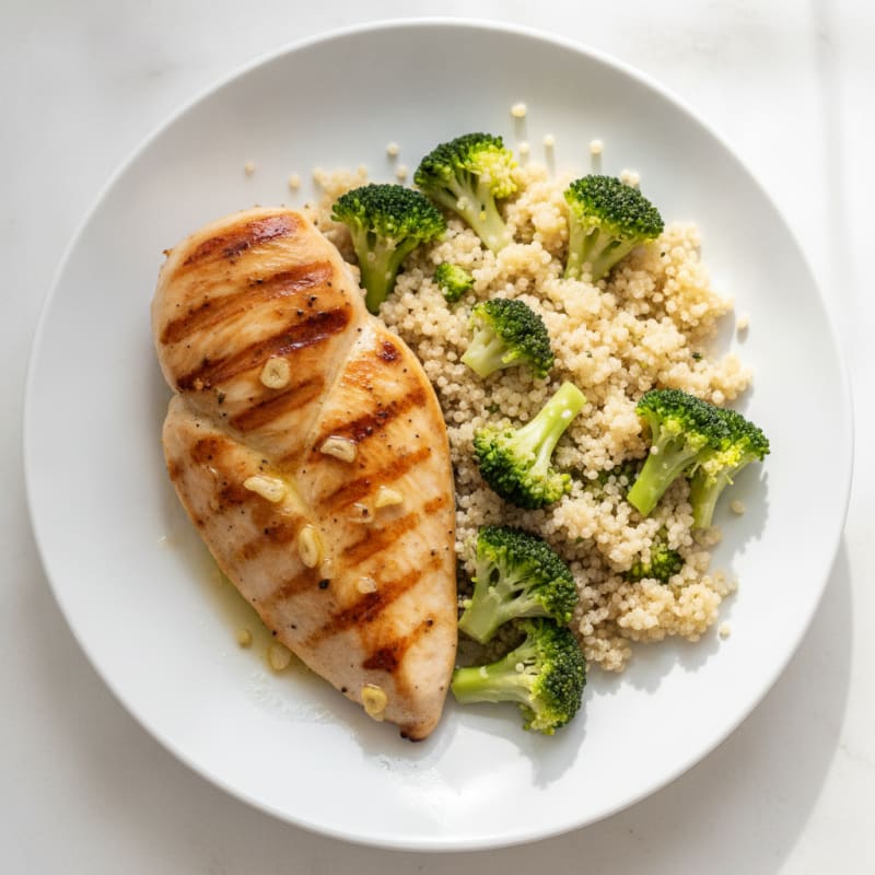 Grilled Chicken Breast with Steamed Broccoli and Quinoa