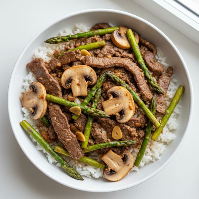 Top Sirloin and Mushroom Stir Fry with White Rice and Asparagus