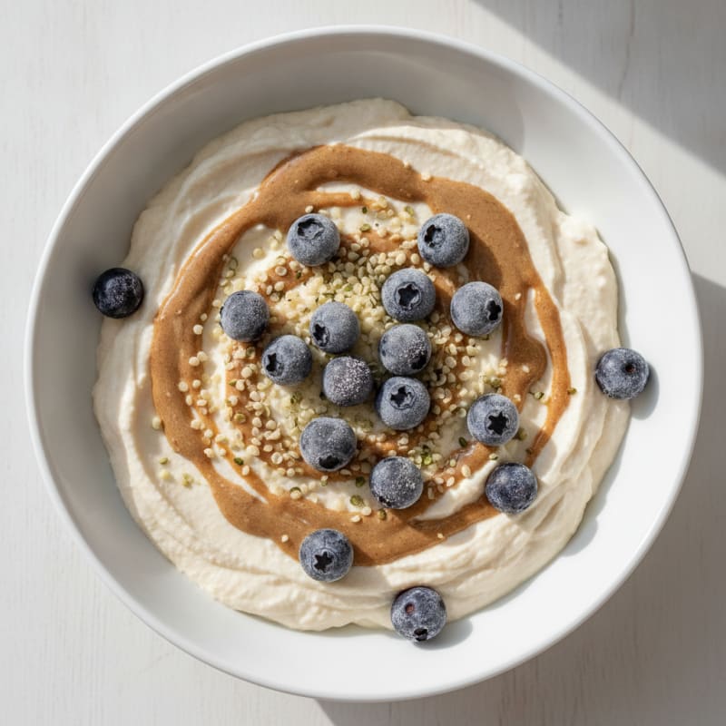 Silken Tofu Protein Smoothie Bowl with Almond Butter and Hemp Seeds