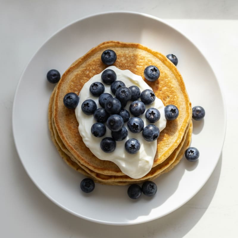 Fluffy Protein Pancakes with Greek Yogurt and Berries