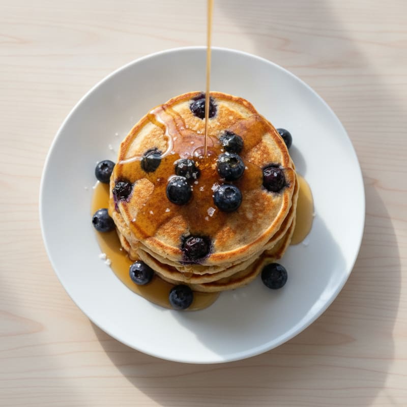 Blueberry Oat Pancakes with Maple Syrup