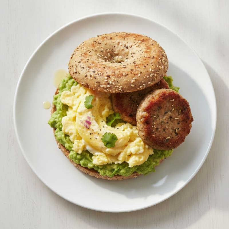 Sausage and Guacamole Bagel with Eggs