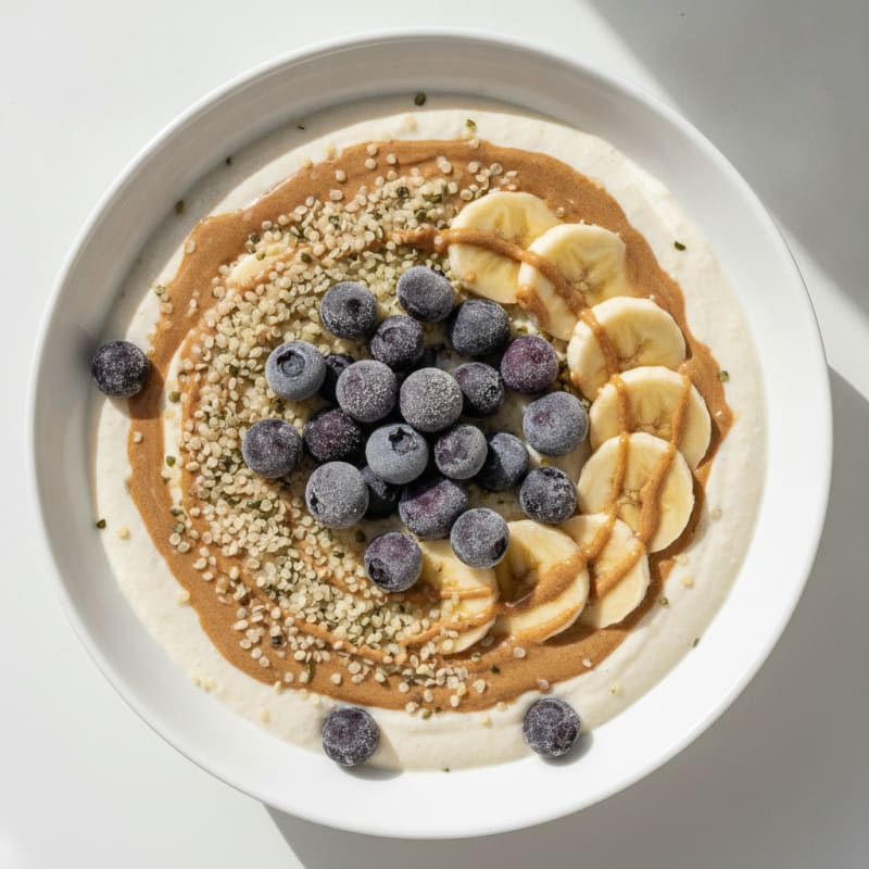 Silky Tofu Protein Smoothie Bowl with Almond Butter and Hemp Seeds