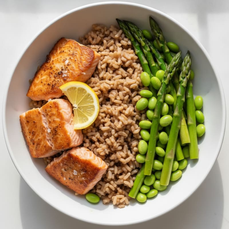 Seared Salmon Protein Bowl with Brown Rice and Steamed Asparagus