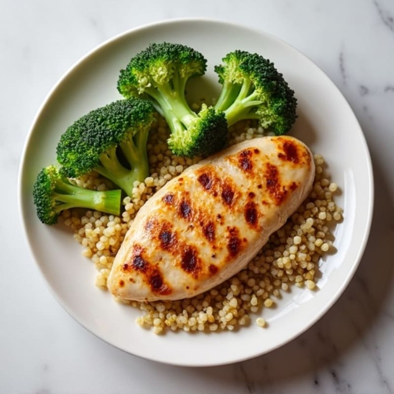 Grilled Chicken Breast with Steamed Broccoli and Quinoa