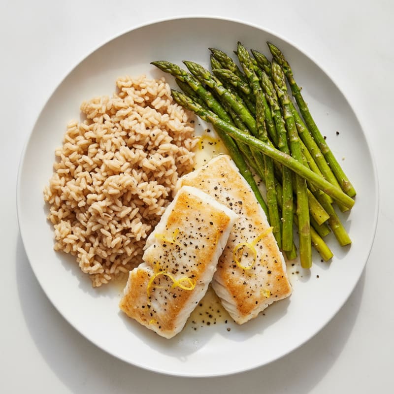 Baked Cod with Lemon Pepper Asparagus and Brown Rice
