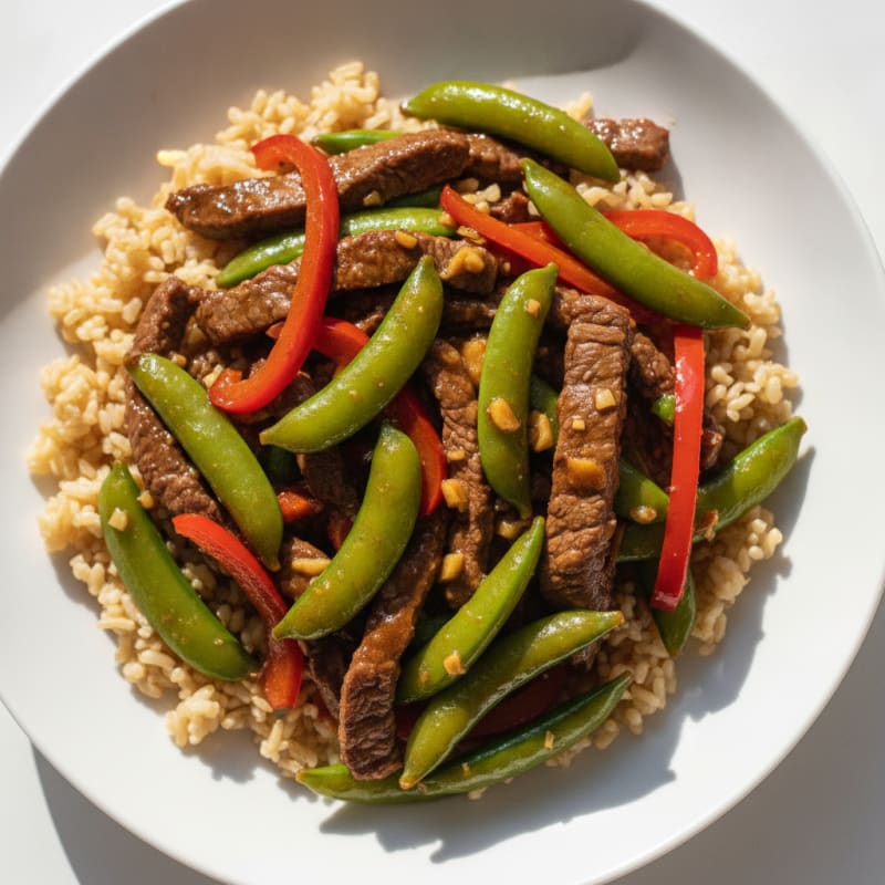 Lean Beef Stir-Fry with Bell Peppers and Snap Peas