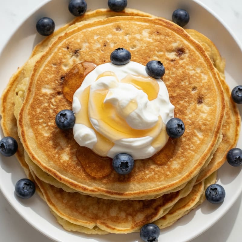 High-Protein Banana and Egg Pancakes with Greek Yogurt