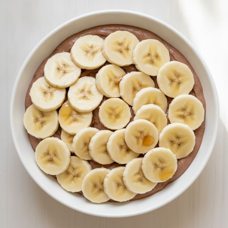 Cottage Cheese Protein Pudding with Cocoa and Sliced Bananas