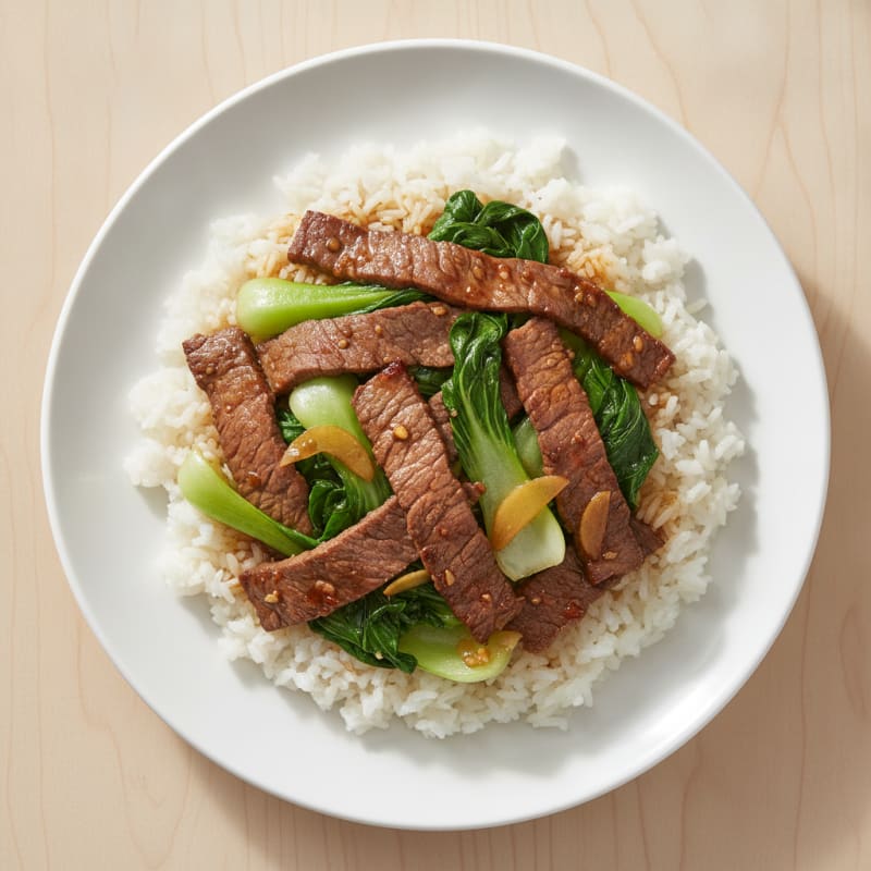 Lean Beef Stir Fry with Steamed Rice and Leafy Greens