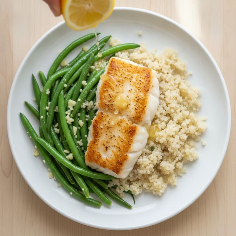 Seared Cod Fillet with Garlic Green Beans and Quinoa