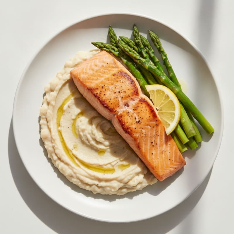 Seared Salmon Fillet with Creamy White Bean Mash and Steamed Asparagus