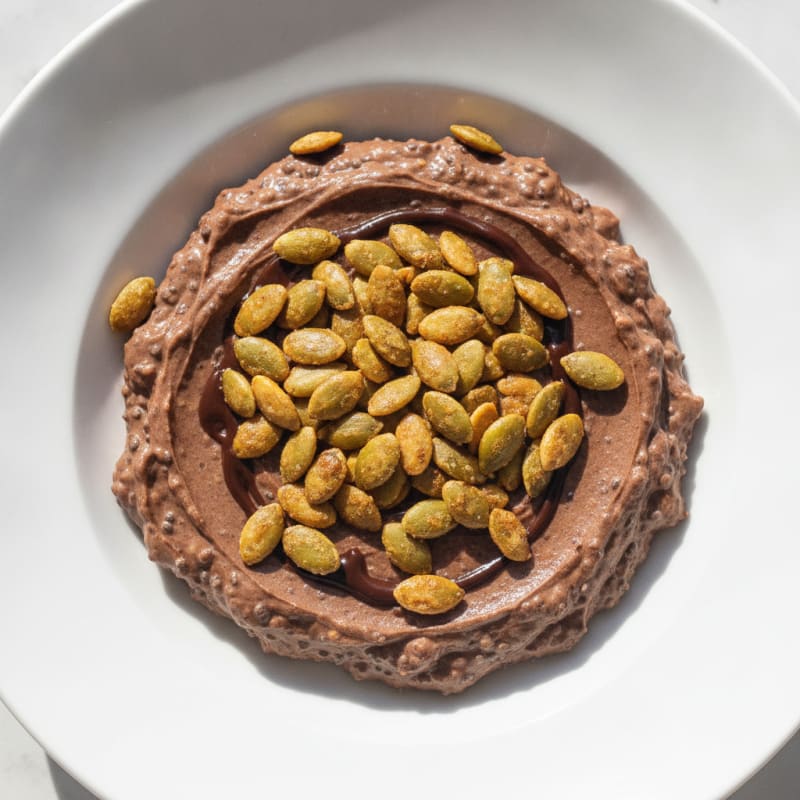 Silky Chocolate Protein Pudding with Toasted Pumpkin Seeds