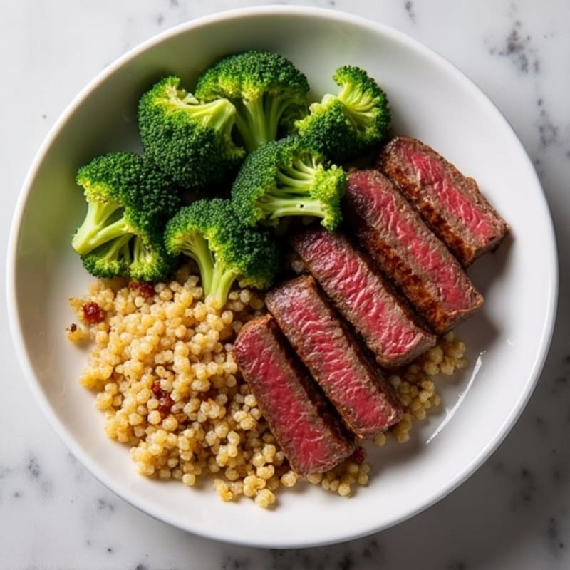 Seared Lean Beef Strips with Roasted Broccoli and Quinoa