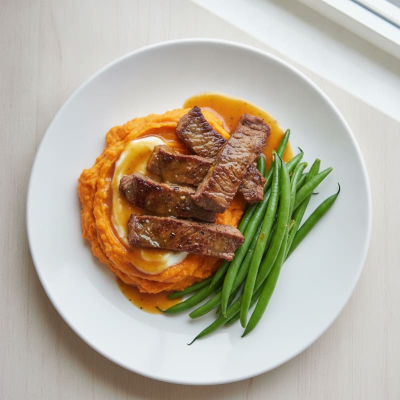 Seared Lean Beef Strips with Sweet Potato Mash and Steamed Green Beans