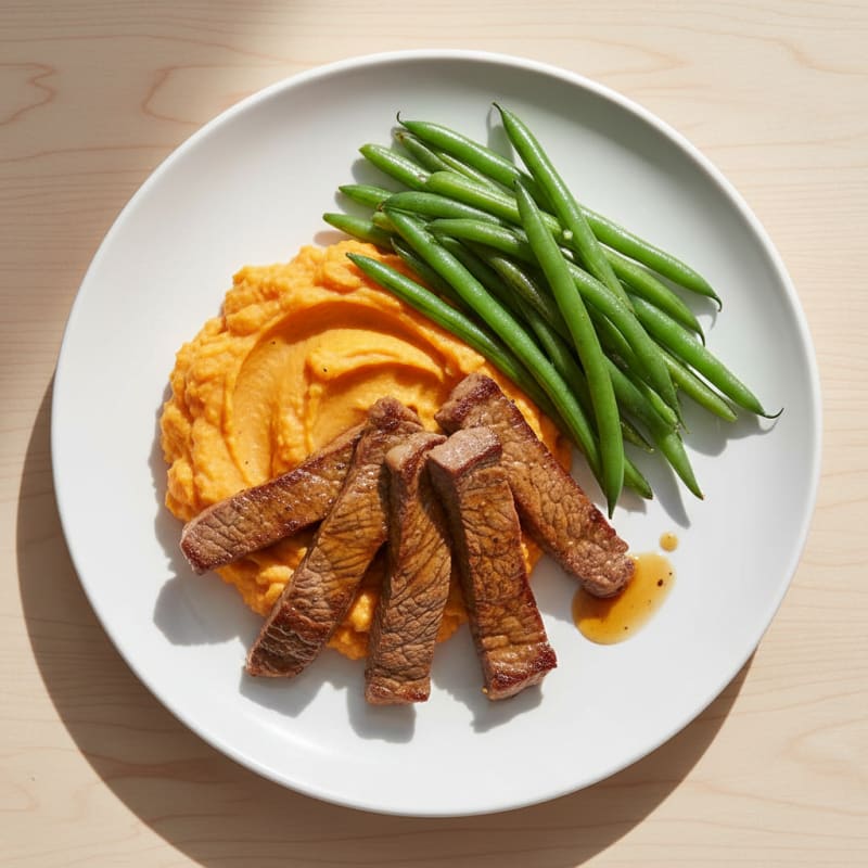 Seared Beef Strips with Steamed Green Beans and Sweet Potato Mash