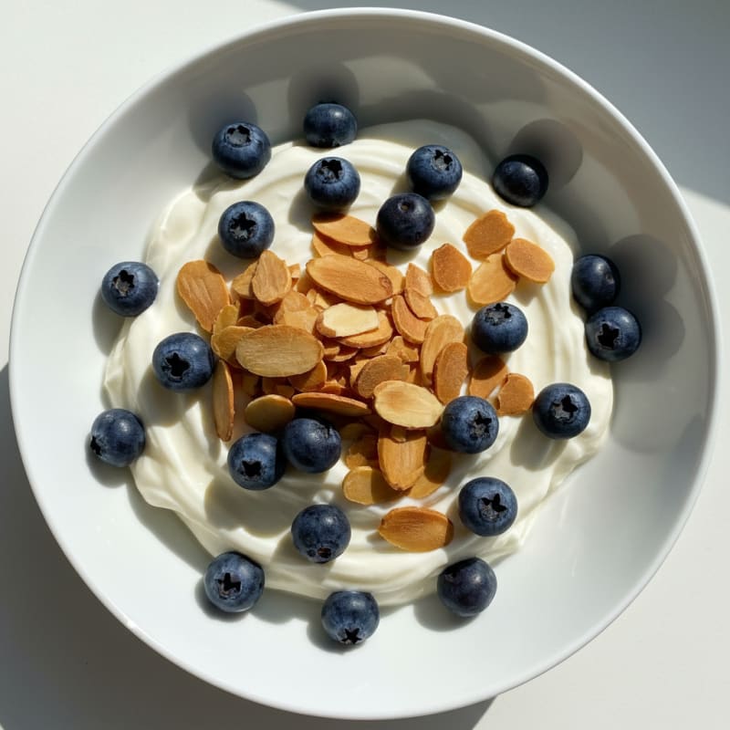 Silky Protein Yogurt Bowl with Berries and Almonds