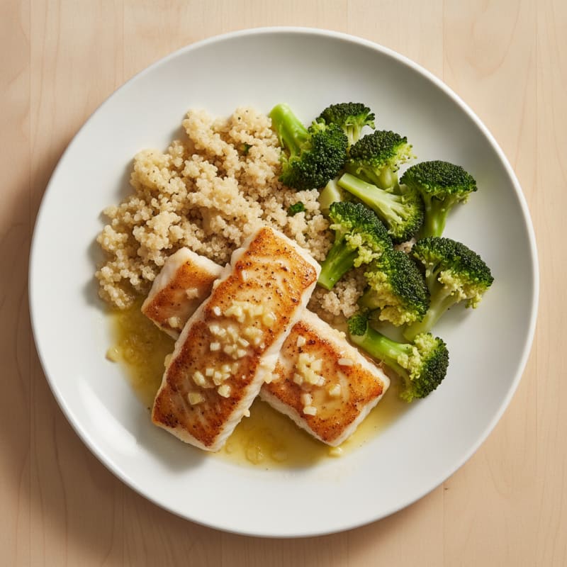 Seared Lemon Garlic Cod with Steamed Broccoli and Quinoa