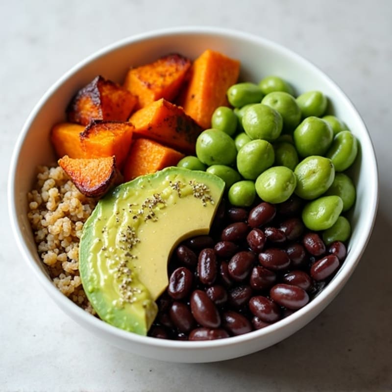 Roasted Sweet Potato and Black Bean Bowl with Creamy Avocado Dressing