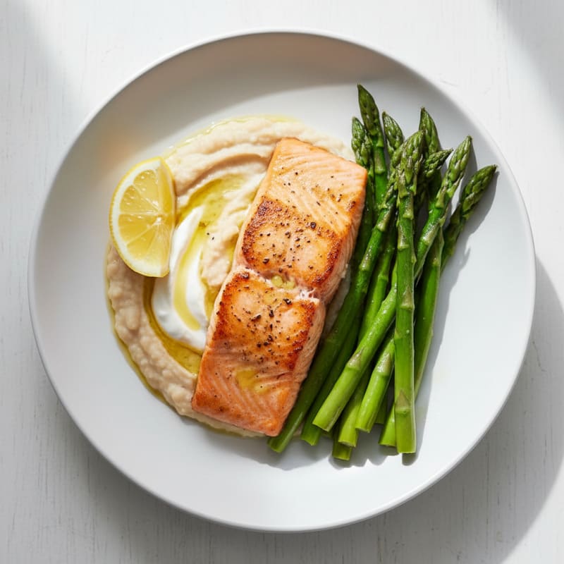Seared Salmon Fillet with Creamy White Bean Mash and Steamed Asparagus
