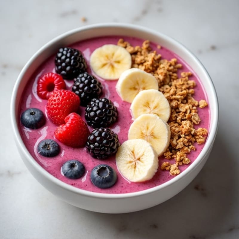 Fresh Berry Banana Protein Smoothie Bowl with Crunchy Granola