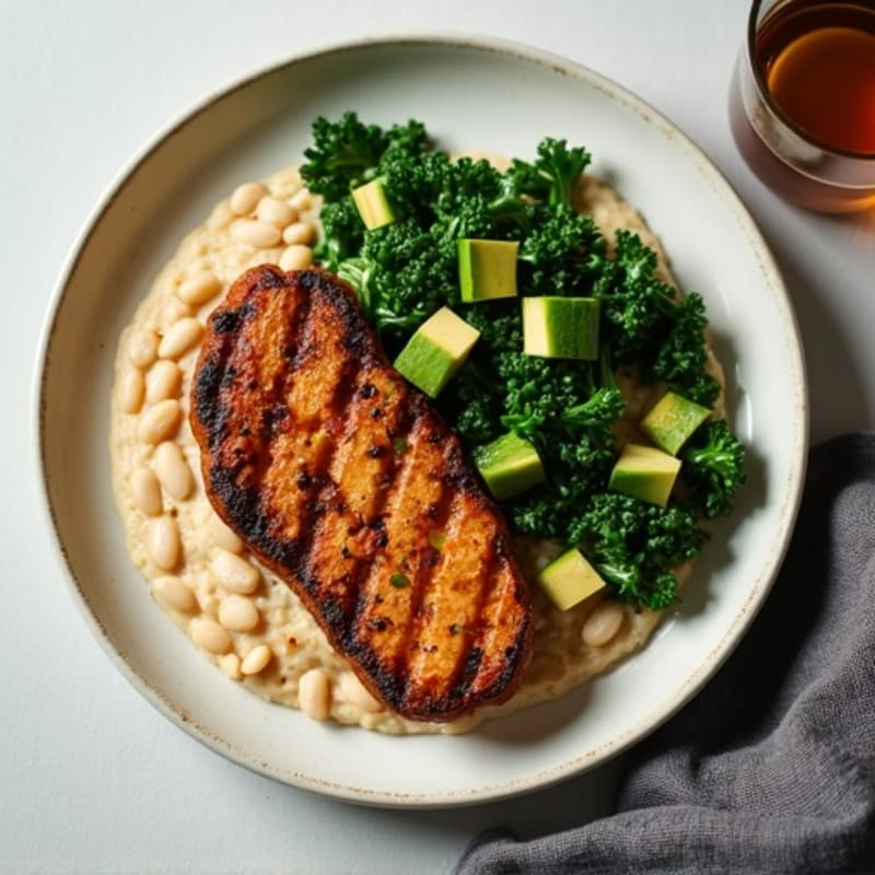 Grilled Seitan Steaks with Creamy White Bean Mash and Sautéed Greens