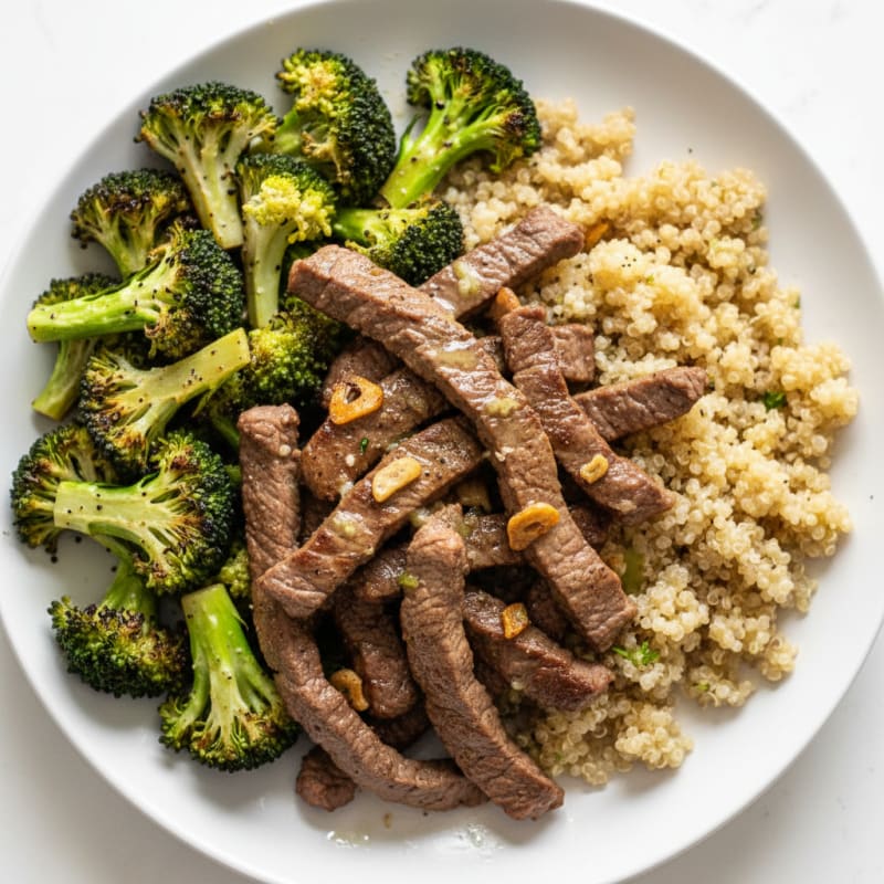Seared Lean Beef Strips with Roasted Broccoli and Quinoa